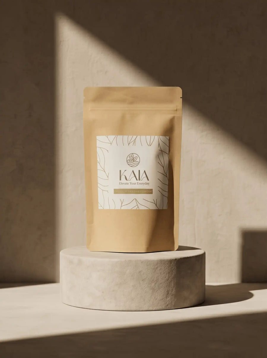KAIA Origin premium pandan powder 100g pouch on stone pedestal, Belgian freeze-dried Southeast Asian leaf