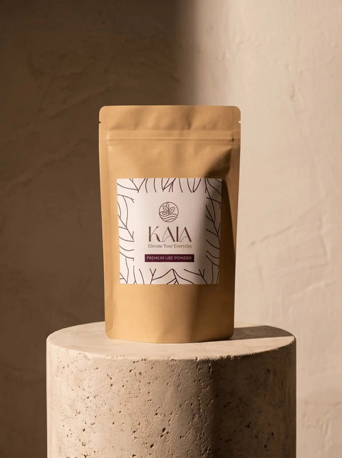 KAIA Origin premium ube powder 100g pouch in editorial  setting, Belgian freeze-dried purple yam premium packaging